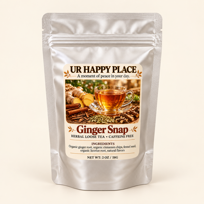A silver stand-up pouch of UR Happy Place Ginger Snap herbal loose tea, featuring a front label with a cup of ginger tea and warm spice imagery, set against a plain cream background.